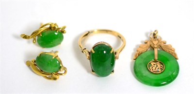 Lot 96 - A jade ring, pair of jade earrings and a jade bi pendant