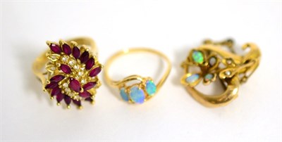 Lot 103 - A 14 carat gold opal ring, an opal and seed pearl brooch and a ruby cluster ring, stamped '585' (3)