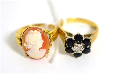 Lot 107 - An 18 carat gold sapphire and diamond cluster ring, finger size L1/2 and a cameo ring, stamped...