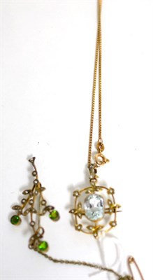 Lot 130 - An Art Nouveau aquamarine and pearl brooch/pendant on chain and a brooch