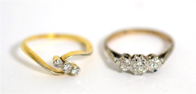 Lot 131 - Two diamond three stone rings