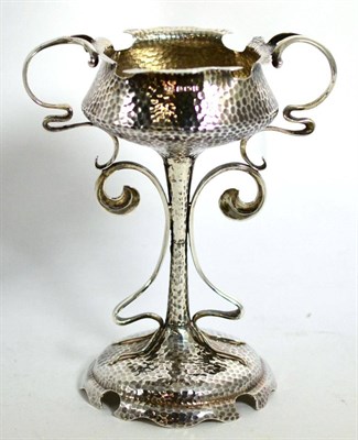 Lot 138 - An Edwardian Arts &amp; Crafts silver twin handled pedestal bowl/cup, Evans &amp; Co,...