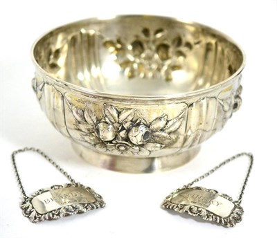 Lot 141 - A German silver rose bowl, repousse decorated with floral reserves; and a pair of modern silver...