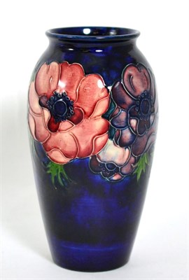 Lot 142 - A Moorcroft pottery vase in the anemone pattern, 19cm