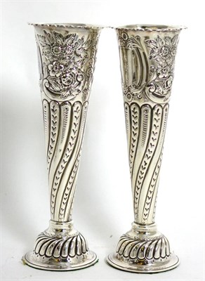 Lot 144 - A pair of late Victorian silver trumpet shaped spill vases, Carrington & Co, London 1897,...