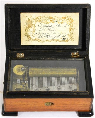 Lot 148 - A small 19th century music box playing four airs, with tune sheet to inside of cover