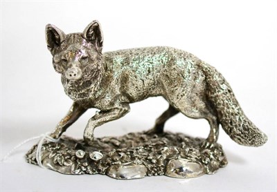 Lot 152 - A filled silver model of a fox, Mappin & Webb, Birmingham date indistinct possibly 1989, 13cm long