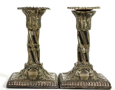 Lot 172 - A pair of Victorian dwarf silver candlesticks John Aldwinckle & Thomas Slater, London 1885,  of...