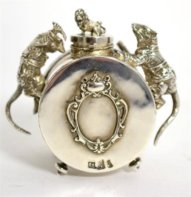 Lot 178 - A Russian style white metal and enamel inkwell, of drum shape applied with climbing rats, a Russian