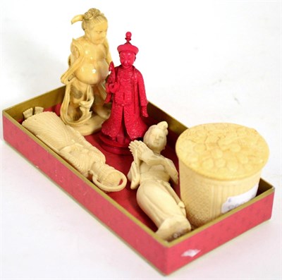 Lot 188 - Three early 20th century ivory figures, stained ivory figural chess piece, and an ivory basket form