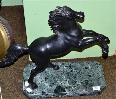 Lot 209 - Tommaso Campaiola (Italian) bronze model of a rearing horse, signed in cast on tail, on a green...