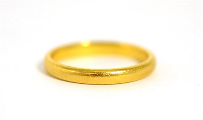 Lot 242 - A 22 carat gold band ring