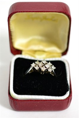 Lot 260 - A diamond cluster ring, stamped '585'