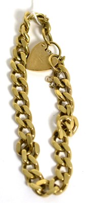 Lot 265 - A 9 carat gold Cuban link bracelet with a 9 carat gold padlock clasp