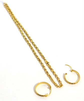 Lot 266 - A curb link necklace, stamped '750' and a pair if hoop earrings, stamped '750'