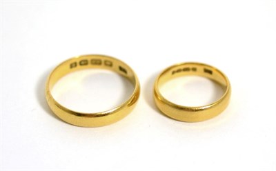 Lot 268 - Two 22 carat gold band rings