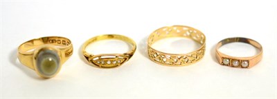 Lot 287 - An 18 carat gold agate ring, two rings stamped '585' and another dress ring (4)