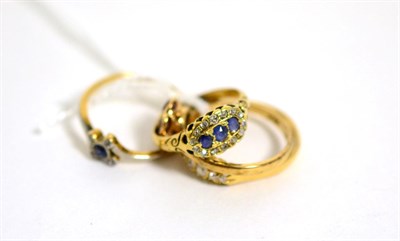 Lot 303 - A five stone diamond ring, a sapphire and diamond ring, a sapphire and diamond ring stamped...