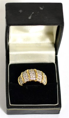 Lot 313 - 18 carat gold broad diamond band ring, pavé set with five bands of round brilliant cut...