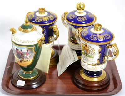 Lot 329 - Four Ainsley commemorative twin handled cups and covers for three for Queen Elizabeth II and...