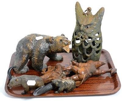 Lot 334 - A Black Forest group of bears and cubs, similar gnome coat rack and cast iron owl pendant lamp