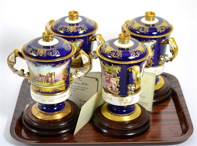 Lot 340 - Four Ainsley commemorative twin handled cups and covers, three for the Queen Mother and one for...