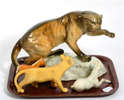 Lot 351 - A Beswick pottery model of a puma and three others