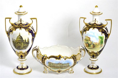 Lot 355 - Three Spode Royal commemorative pieces comprising two similar urns and covers, one depicting St...