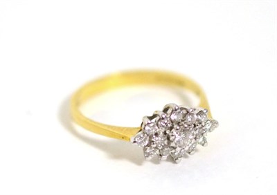 Lot 362 - An 18 carat gold diamond cluster ring, total estimated diamond weight 0.40 carat approximately,...