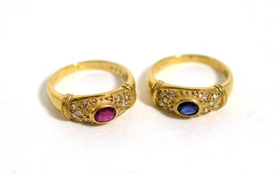 Lot 374 - A 9 carat gold ruby and diamond set ring, total estimated diamond weight 0.20 carat...