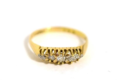 Lot 402 - A five stone diamond ring