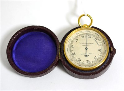 Lot 411 - A Negretti & Zambra compensated pocket barometer, in leather case