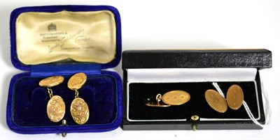 Lot 424 - Two pairs of 9 carat gold double oval cufflinks