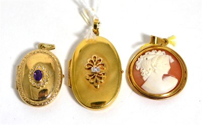 Lot 428 - A 9 carat gold diamond set locket pendant, a 9 carat gold amethyst and diamond locket pendant and a