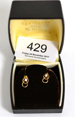 Lot 429 - A pair of diamond solitaire earrings, total estimated diamond weight 0.10 carat approximately