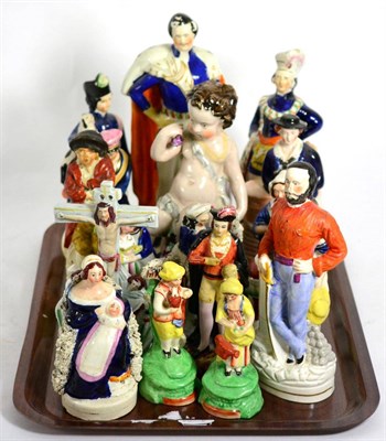 Lot 445 - A group of assorted Staffordshire pottery figures