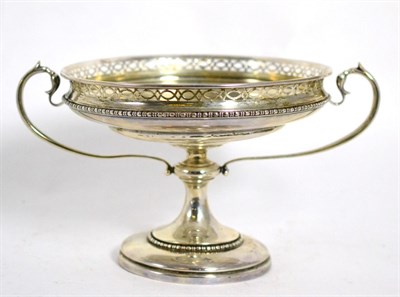 Lot 464 - A silver pedestal comport, Manoah Rhodes & Sons Ltd, London 1912, with pierced rim and twin...