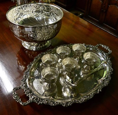 Lot 515 - A large silver plated punch bowl by Viners, with six cups and ladle; together with a large twin...