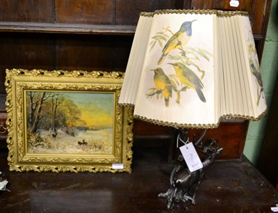 Lot 517 - A late 19th century oil on board of Roe deer in a winter scene at the side of a wood in a gilt...