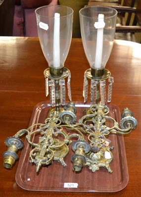 Lot 521 - Pair of brass two-light wall scones and a pair of brass lustre type candle holders