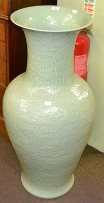 Lot 529 - A very large Oriental celadon glazed vase, moulded in relief with dragons, modern