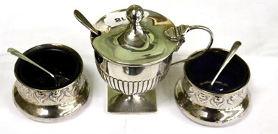 Lot 546 - A Victorian silver mustard and pair of floral salts