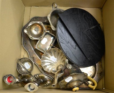 Lot 1000 - A group of silver comprising a basket, shell butter dish, candlesticks and silver plate including a