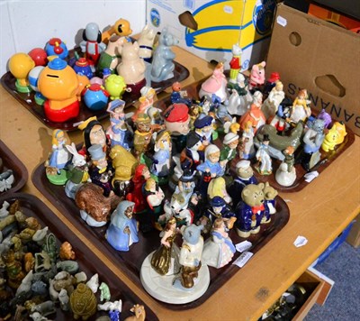 Lot 1047 - A large collection of Wade pottery including Mr Men series and various part sets including...