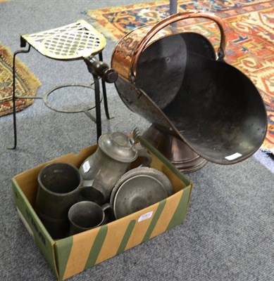 Lot 1061 - A copper coal scuttle; brass and cast iron trivet; and a group of pewter mugs and bowls