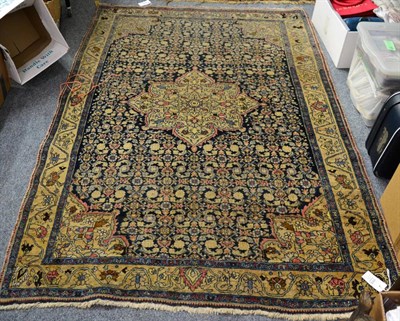 Lot 1115 - Bidjar rug, Iranian Kurdistan, the deep indigo Herati field centred by a pale lemon flowerhead...