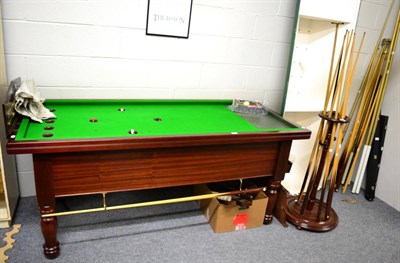 Lot 1121 - A Thurston mahogany bar billiards table, together with associated score board, lights, cues,...