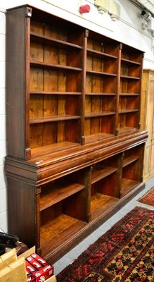 Lot 1126 - A substantial pitch pine library bookcase