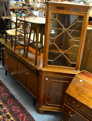 Lot 1130 - A corner display cabinet and a sideboard