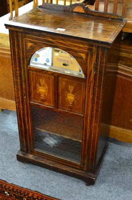 Lot 1138 - A late 19th century simulated rosewood music cabinet